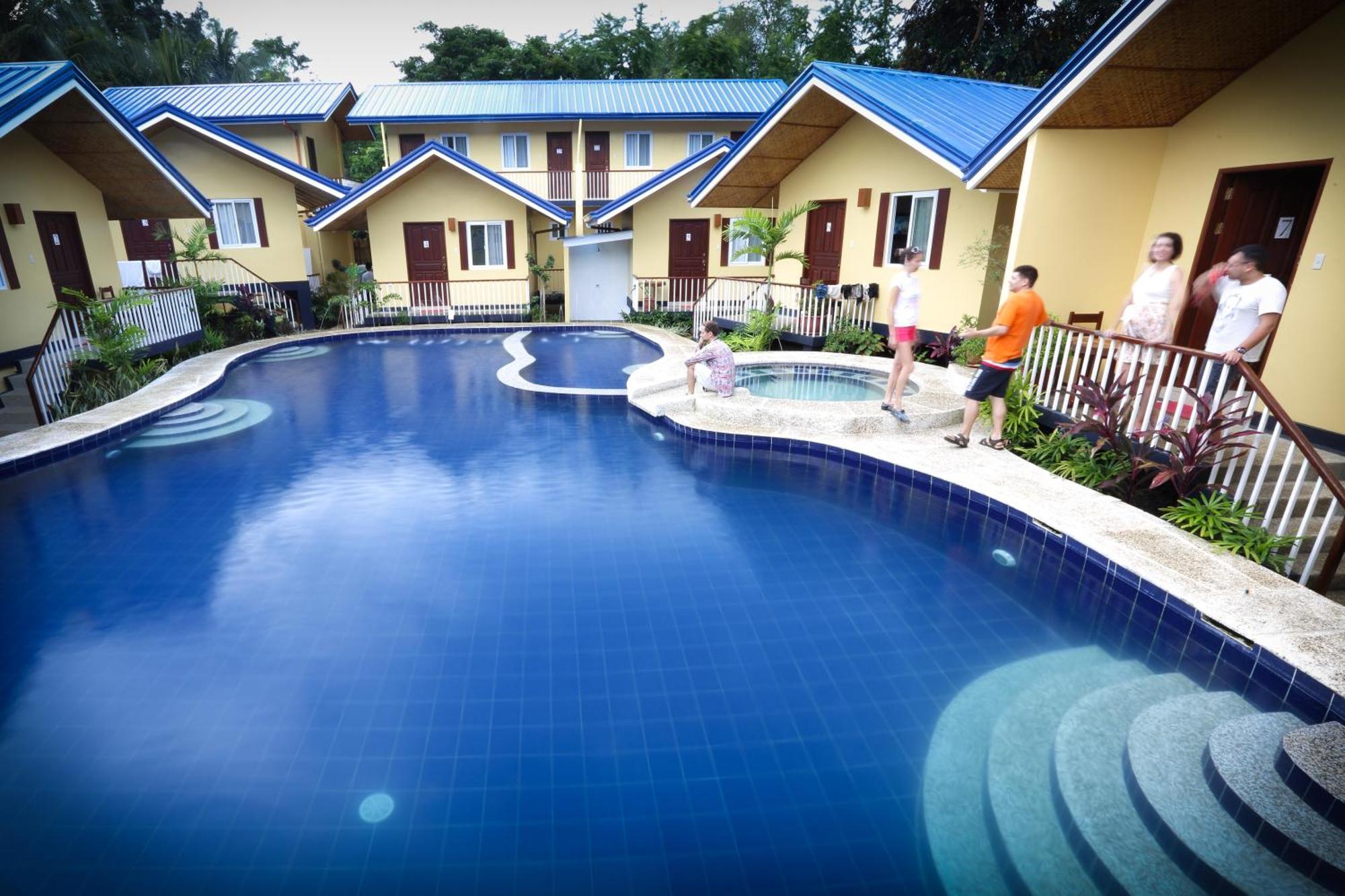 บลู ลากูน อินน์ แอนด์ สวีท Puerto Princesa ภายนอก รูปภาพ